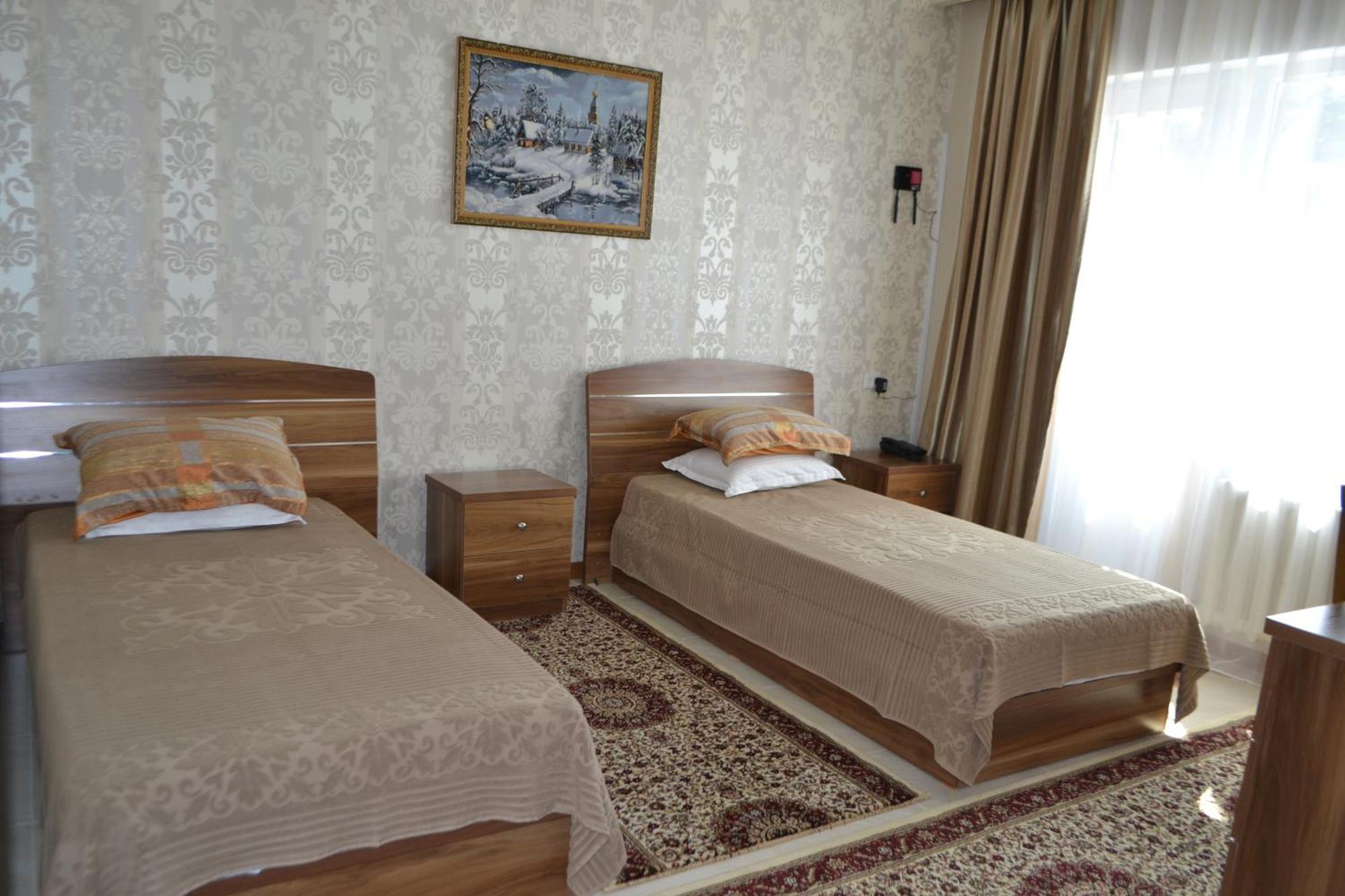 Gostinitsa Grand Hotel Kyzylorda Quarto foto